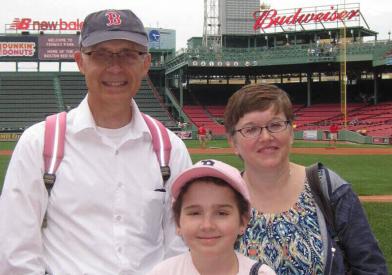 Erica Leafquist with her father Eric and mother Kathy at Fenway Park, 2013